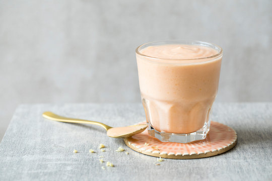 Papaya, coconut and ginger smoothie drink