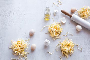 Bundles of raw homemade fettuccini pasta