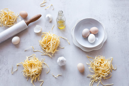 Bundles of raw homemade fettuccini pasta