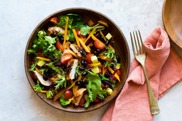 Chicken salad bowl with black beans and veggies
