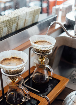 Making a pour over coffee.