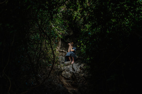 Woman alone in the darkness