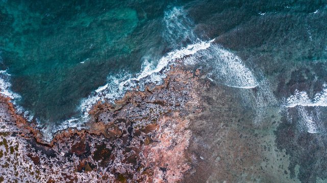 Drone View Of A Tropical Beach - coral reef with transparent water