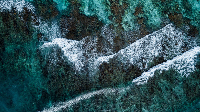 Drone View Of A Tropical Beach - coral reef with transparent water