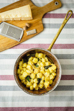 Gnocchi with butter, grana cheese and sage leaves