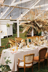 Summer outdoor wedding themes. Rustic Wedding table. Celebration background