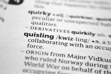 Fototapeta premium Word or phrase Quisling in a dictionary.