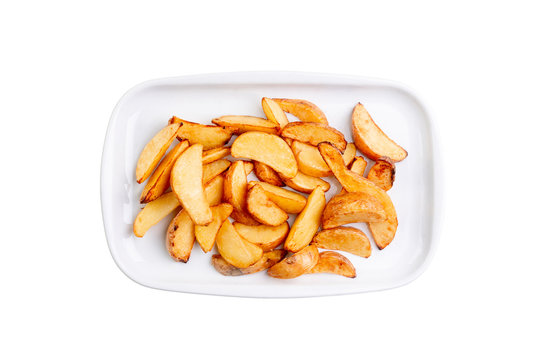 Potato wedges on white plate isolated on white background. Hot fastfood. Top view Food Image for menu card, web design, site, shop or delivery. High quality retouch and isolation