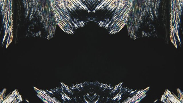Psychedelic Moving Background. Crystal Growth Under Microscope Timelapse