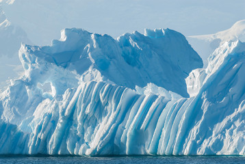 Fototapeta na wymiar Tempano floating in the Antarctic Sea, near the Antarctic Peninsula.