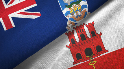 Falkland Islands and Gibraltar two flags textile cloth, fabric texture