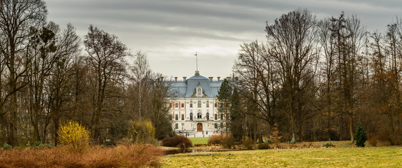 Fototapeta na wymiar The renovated palace in Pszczyna with a beautiful park and walking paths.