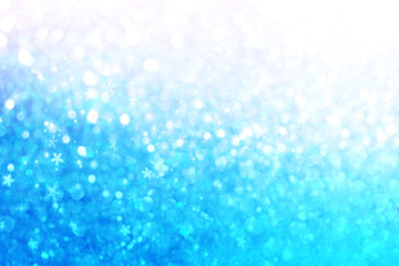 Blurred bokeh light blue pink holographic background, Christmas and New Year holidays abstract texture.