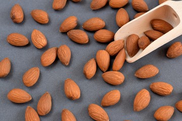 Almonds on black background