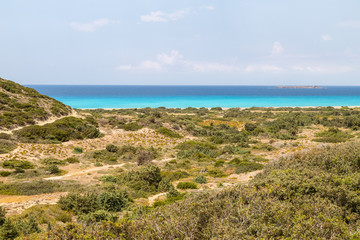 Landscape on the west coast of Rhodes island near Kattavia with green vegetation in the foreground...