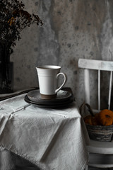 On the table a Cup of hot tea for Dating.