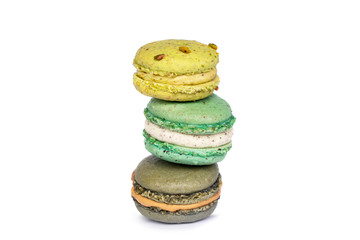 Colorful macaroons on white background