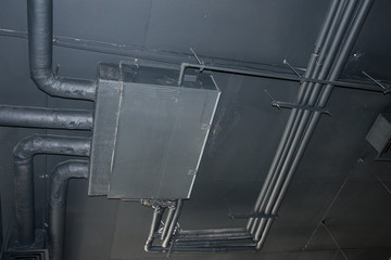 Branching system for pipes on the ceiling, hydraulic connections in the room.
