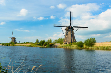 Fototapeta na wymiar Kinderdijk is the largest cluster of historic windmills in the Netherlands.