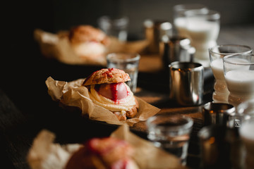 Food concept. Breakfast with coffee espresso, milk and shu dessert in cafe