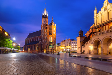 Medieval Main market square with Basilica of Saint Mary in Old Town of Krakow at sunrise, Poland