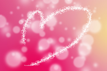 Pink heart shaped trail light spot creative background.