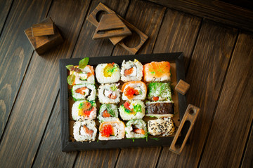 The mosaic sushi roll, varius rolls in mosaic pattern top view