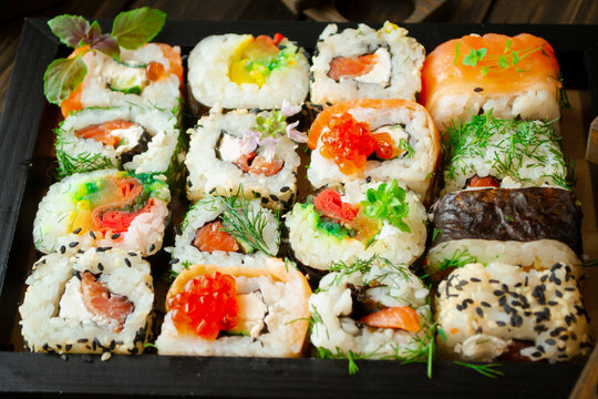 Varius mosaic sushi roll, close up image