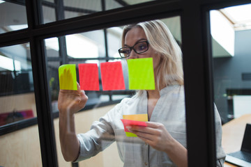 Happy and confident girl Manager plans to work on the project