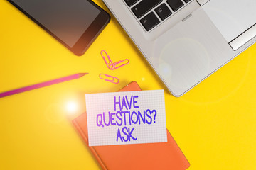 Conceptual hand writing showing Have Questionsquestion Ask. Concept meaning something that you say or write to ask a demonstrating Laptop smartphone clip pencil paper sheet colored background