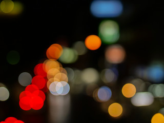 Colourful light bokeh on the dark background