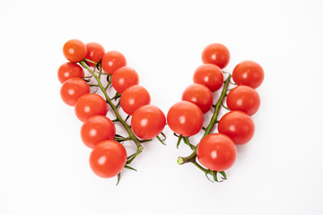 Cherry tomatoes isolated on white background