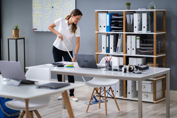 Janitor Mopping Floor In Office