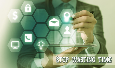 Conceptual hand writing showing Stop Wasting Time. Concept meaning advising demonstrating or group...