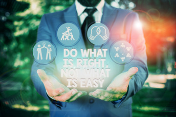 Writing note showing Do What Is Right Not What Is Easy. Business concept for willing to stand up...