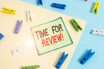 Conceptual hand writing showing Time For Review. Concept meaning formal assessment of something with intention instituting change Colored clothespin paper reminder with yellowblue background
