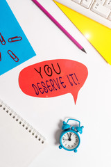 Writing note showing You Deserve It. Business concept for should have it because of their qualities...