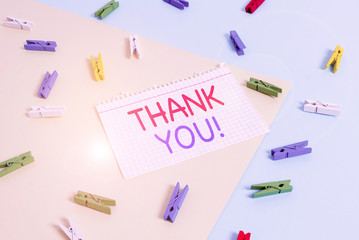 Handwriting text Thank You. Conceptual photo polite expression used when acknowledging gift service compliment Colored clothespin paper empty reminder yellow blue floor background office