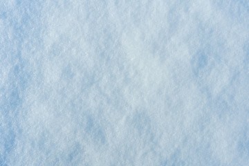 Obraz premium background of fresh snow texture in blue tone