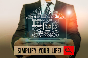 Conceptual hand writing showing Simplify Your Life. Concept meaning focused on important and let...