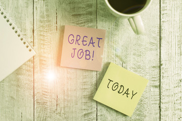 Text sign showing Great Job. Business photo showcasing used praising someone for something they have done well Stationary placed next to a cup of black coffee above the wooden table