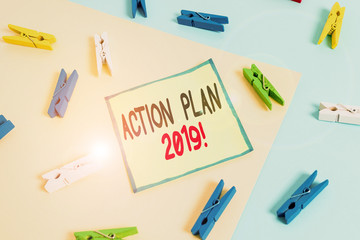 Conceptual hand writing showing Action Plan 2019. Concept meaning proposed strategy or course of...