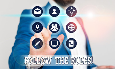 Conceptual hand writing showing Follow The Rules. Concept meaning go with regulations governing...