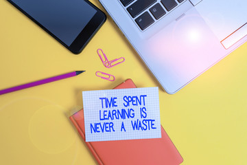 Conceptual hand writing showing Time Spent Learning Is Never A Waste. Concept meaning education has no end Keep learning Laptop smartphone clip pencil paper sheet colored background