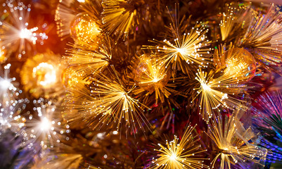 Obraz na płótnie Canvas Christmas fiber optic decorated Tree with dectoration,holiday concept.