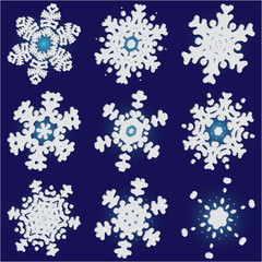 Fototapeta na wymiar Collection of simple snowflakes on blue background.