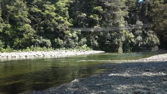 Swing Bridge on a walking trail at Kaitoke in New Zealand 