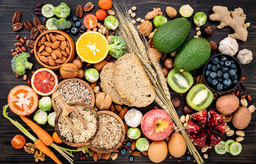 Ingredients for the healthy foods selection. The concept of healthy food set up on wooden background.