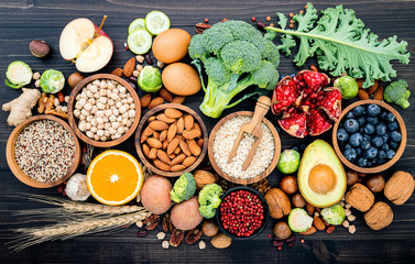 Ingredients for the healthy foods selection. The concept of healthy food set up on wooden background.
