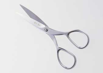 Silver scissors isolated on white background